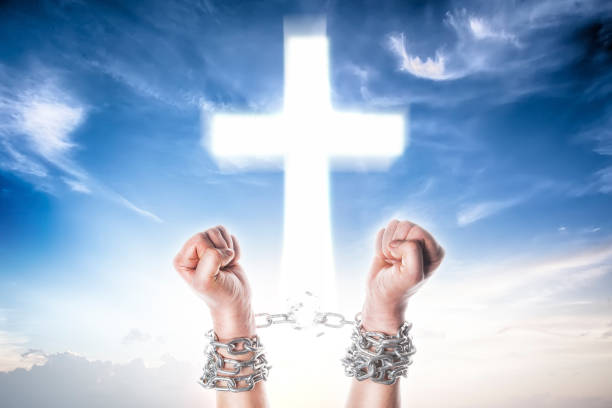 Two hands in chains on a white background