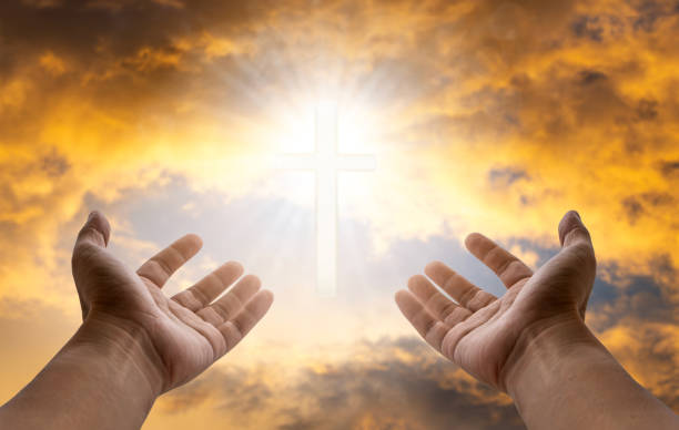 Catholic hands Christian opens his palms and asks God to help him repent of the Christian faith. Catholicism. Christian religion concept.